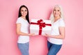 Profile photo of pretty old mother young daughter ladies holding large gift box present hands son grandson birthday wear Royalty Free Stock Photo