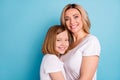 Profile photo of two people beautiful mommy lady small little daughter blonds hugging good mood best friends wear casual