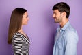 Profile photo of two people couple guy lady standing opposite looking eyes friendly smiling finally meet wear stylish