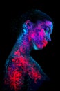 Profile portrait of a beautiful girl alien. Ultraviolet body art blue night sky with stars and pink jellyfish Royalty Free Stock Photo