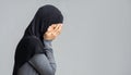 Profile portrait of crying muslim woman covering her face with hands Royalty Free Stock Photo