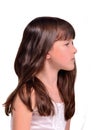 Profile portrait of little girl with long hair