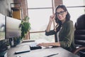 Profile portrait of positive successful web designer girl sit chair hand touch eyeglasses open space indoors Royalty Free Stock Photo