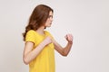 Profile portrait of serious concerned woman of young age holding clenched fists up ready to boxing Royalty Free Stock Photo