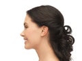 Profile portrait of smiling young woman Royalty Free Stock Photo