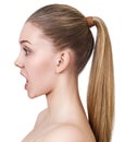 Profile portrait of surprised young woman with open mouth. Royalty Free Stock Photo