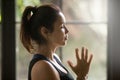 Profile portrait of young attractive yogi woman with Namaste Royalty Free Stock Photo