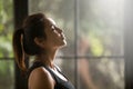 Profile portrait of young attractive yogi woman