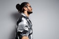 Profile portrait of young handsome man, wearing glasses and plaid shirt Royalty Free Stock Photo