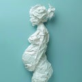 Profile of pregnant woman carefully holding her big belly, made of crumpled paper, motherhood, expecting child