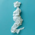 Profile of pregnant woman carefully holding her big belly, made of crumpled paper, motherhood, expecting child