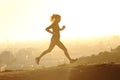 Profile of a runner silhouette running at sunset