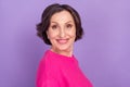 Profile side photo of aged attractive woman happy positive smile wear casual outfit isolated over violet color Royalty Free Stock Photo