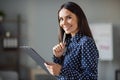 Profile side photo of cheerful happy young business woman new idea hold clipboard make plan in office workplace