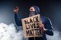 Profile side photo of crazy afro american rebellion man hold banner raise fists encourage fight human rights african