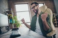 Profile side photo of delighted editor achieve debugging script server quality security raise fists-up sit desk in Royalty Free Stock Photo