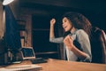 Profile side photo ecstatic afro american girl it developer sit evening desk work computer hacked artificial Royalty Free Stock Photo