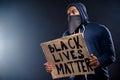 Profile side photo of shocked afro american guy hold banner impressed police community injustice racism issues wear