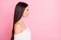 Profile side photo of young attractive good looking calm peaceful girl with long brown silky hair on pink color