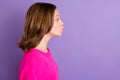 Profile side photo of young beautiful lovely pretty girl look copyspace pout lips kiss isolated on violet color Royalty Free Stock Photo