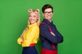 Profile side photo of young cheerful couple folded hands partners dance party glasses isolated over green color Royalty Free Stock Photo