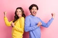 Profile side photo of young excited couple happy positive smile rejoice victory ecstatic lucky isolated over pink color