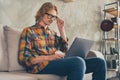 Profile side photo of young guy hand touch glasses focused browse computer programmer jawascript remote work indoors