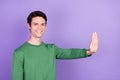 Profile side photo of young guy happy positive smile show hand decline no veto sign isolated over violet color