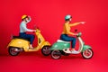 Profile side view of her she his he nice attractive cheerful cheery couple tourists riding moped enjoying city tour Royalty Free Stock Photo