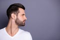 Profile side view photo of charming lovely attractive man look feel gorgeous concentrated focused isolated dressed white Royalty Free Stock Photo