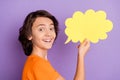 Profile side view portrait of attractive cheerful boy holding cloud copy space message chat isolated over violet purple Royalty Free Stock Photo