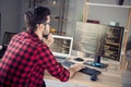 Profile side view portrait of attractive skilled focused guy writing html code css language php at work place station