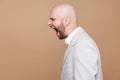 Profile side view portrait crazy anger of middle aged bald beard