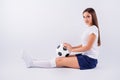 Profile side view portrait of her she nice attractive lovely pretty content straight-haired girl sitting with ball world