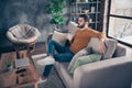 Profile side view portrait of his he nice-looking attractive confident peaceful bearded guy drinking latte espresso