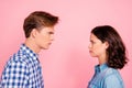 Profile side view portrait of nice attractive mad couple looking Royalty Free Stock Photo