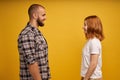 Profile side view portrait of nice lovely charming attractive cheerful flirty couple looking at each other talk conversation