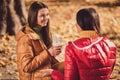 Profile side view portrait of two nice attractive lovely pretty friendly cheerful cheery best girlfriends spending Royalty Free Stock Photo