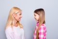 Profile side view portrait of two nice cute charming attractive lovely adorable sweet tender cheerful people wearing Royalty Free Stock Photo