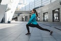 Young adult athlete woman training outdoor in city