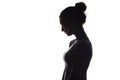 Profile silhouette of a pensive girl, a young woman lowered her head down on a white isolated background Royalty Free Stock Photo