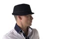 Profile view of attractive young man with fedora and white shirt Royalty Free Stock Photo