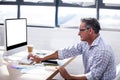 Profile view of businessman typing on his keyboard Royalty Free Stock Photo