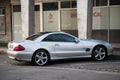 Profile view of grey Mercedes benz 500sl parked in the street Royalty Free Stock Photo