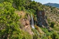 Hiking track over waterfall with tourists in Chera, Spain Royalty Free Stock Photo