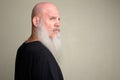 Profile view of mature bald man with long gray beard Royalty Free Stock Photo