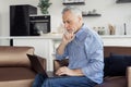 Senior man making video call on laptop computer Royalty Free Stock Photo