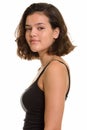 Profile view of teenage girl looking at camera Royalty Free Stock Photo