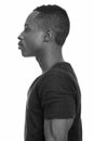 Profile view of young handsome African man Royalty Free Stock Photo