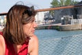 Profile woman in port boat in La Rochelle harbor in southwest France